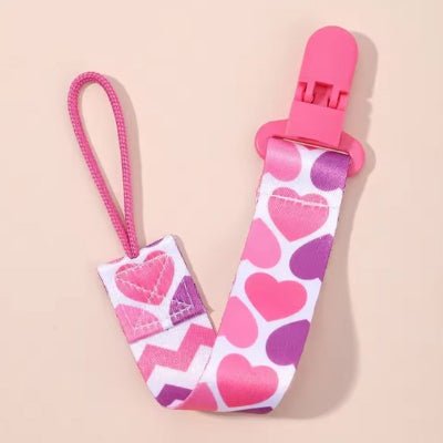Attache tetine rose